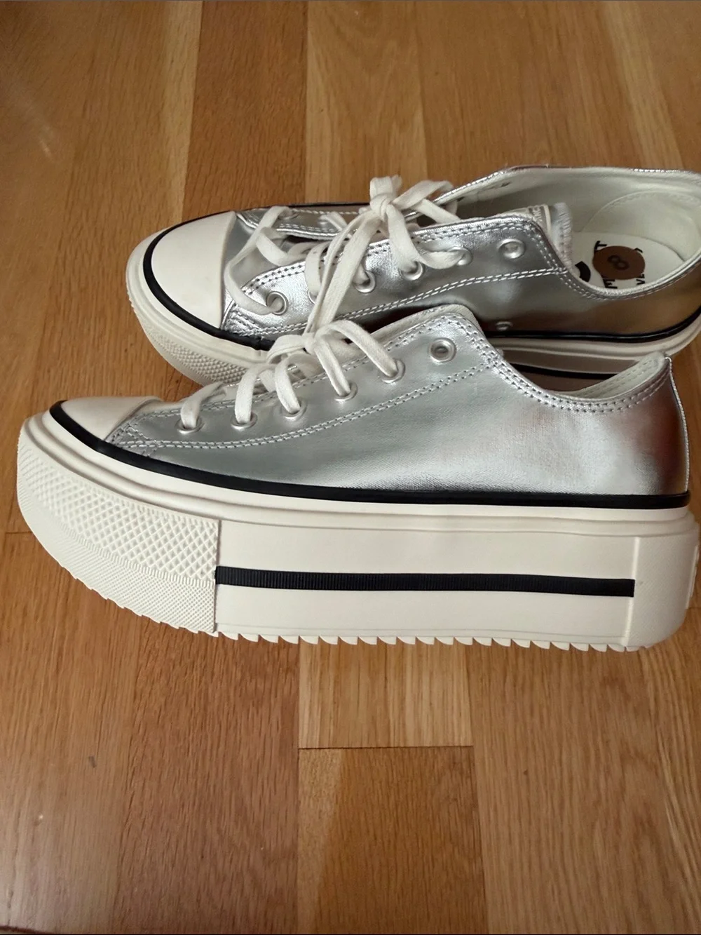 Converse Women’s Platform Sneakers - Metallic Silver with White Sole.